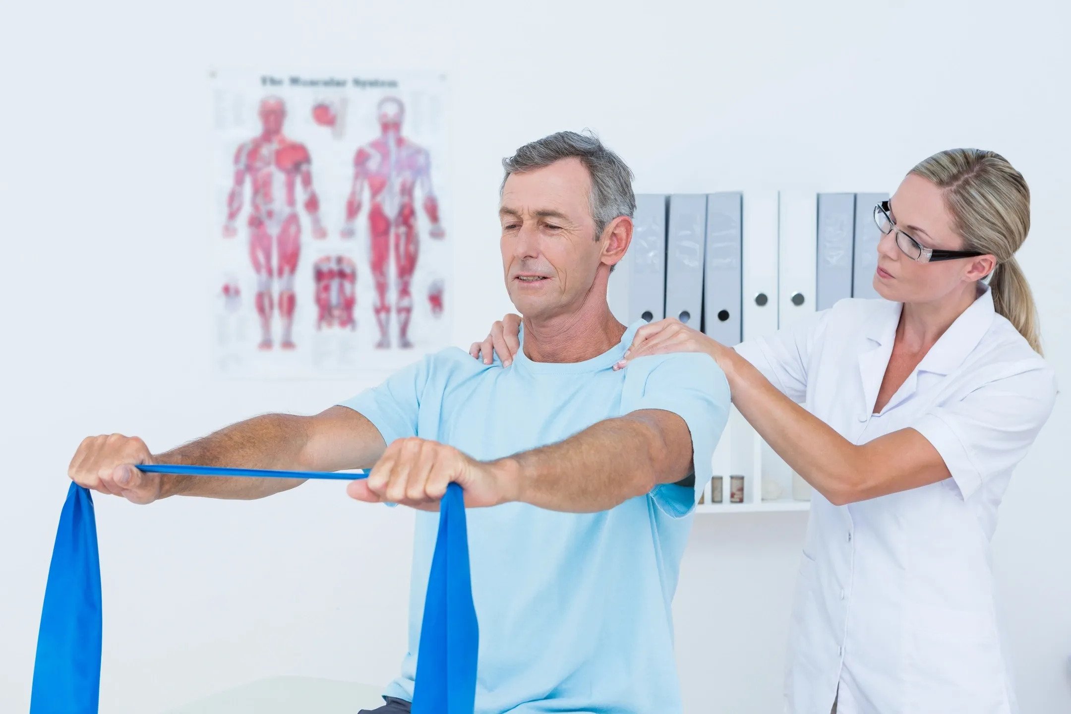 Chiropractor performing spinal adjustment